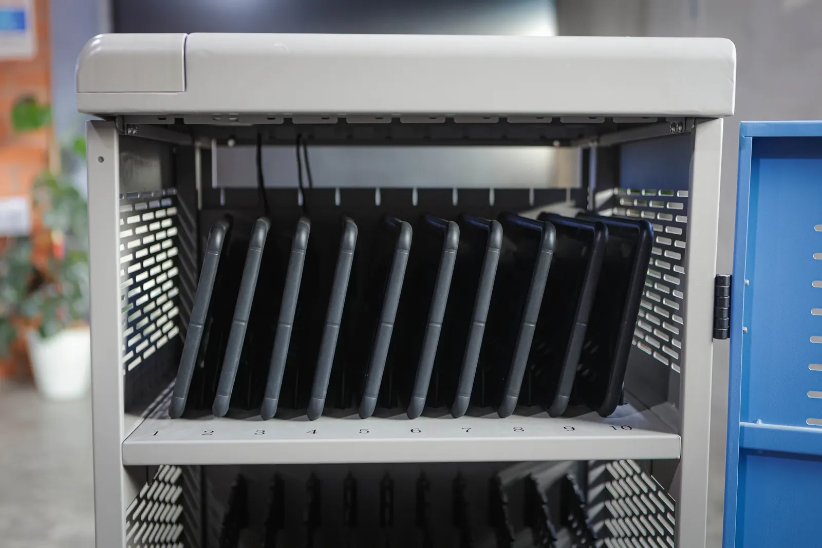 The inside of the cart, with the bays divided and the cables tucked away
