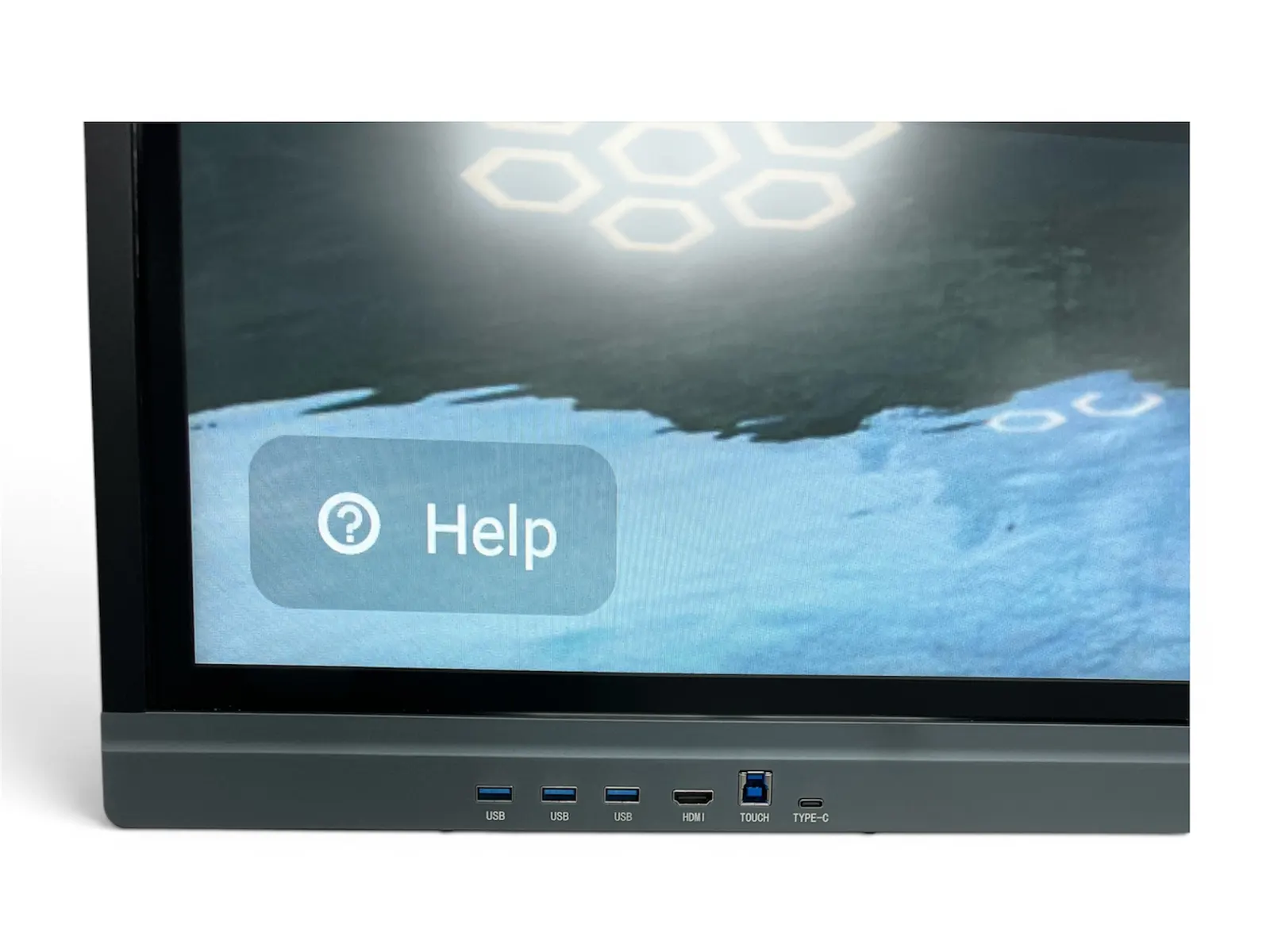 Close-up of the eScreen's front ports (USB, HDMI, touch input and USB-C) with the on-screen help button